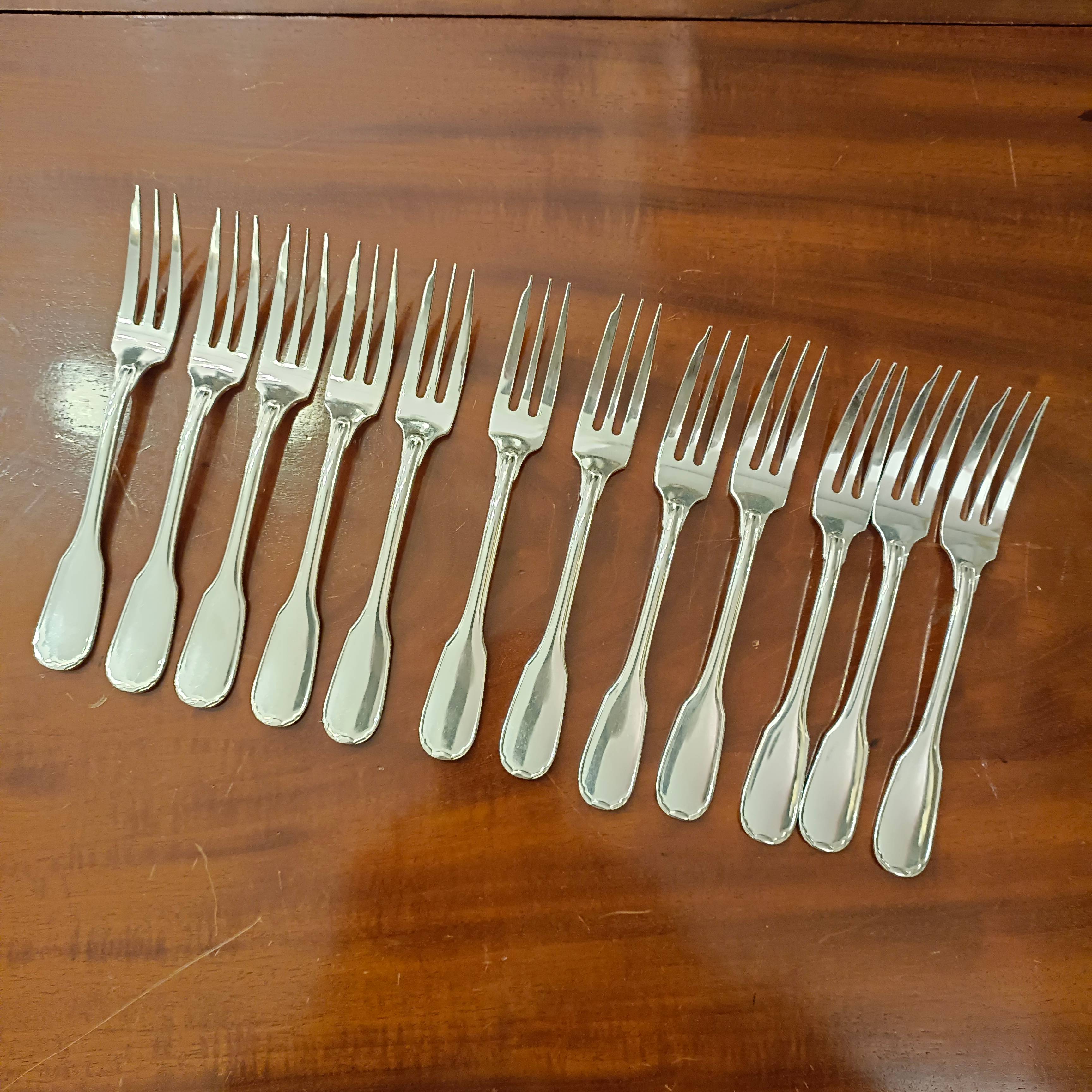 12 fourchettes à huitres en métal argenté, uniplat moderniste, Christofle -  Début de Série